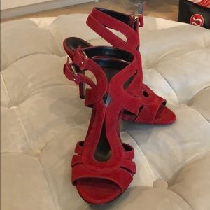 Strapped red stilettos